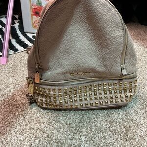 Michael Kors Taupe Backpack with Gold Studs needs some TLC